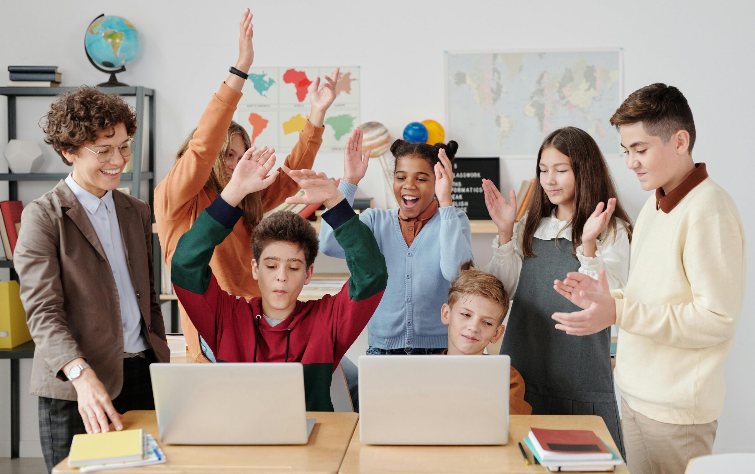 Kids cheering in classroom